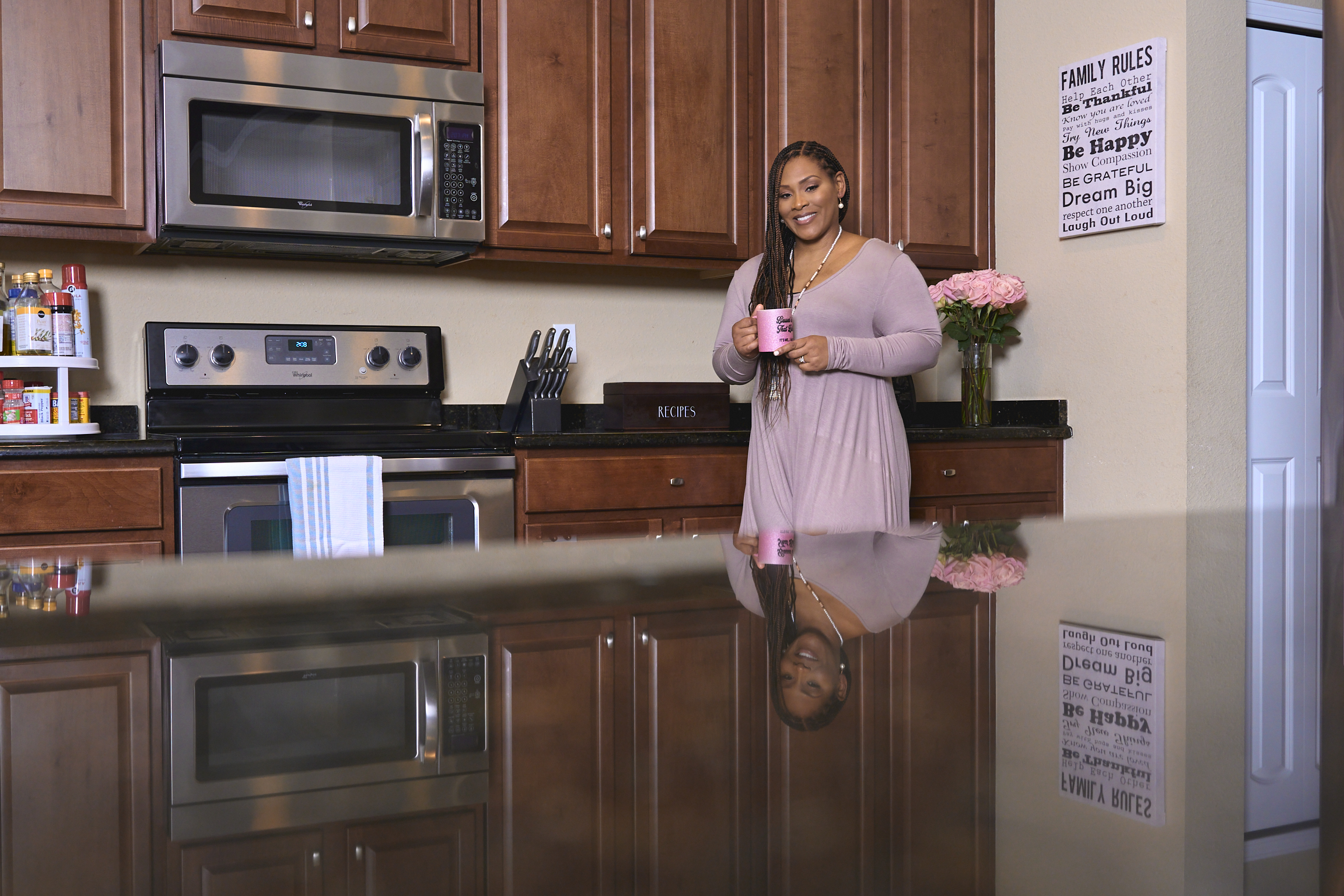 Mom taking a quiet moment for herself at home, representing the importance of self-care for busy moms.